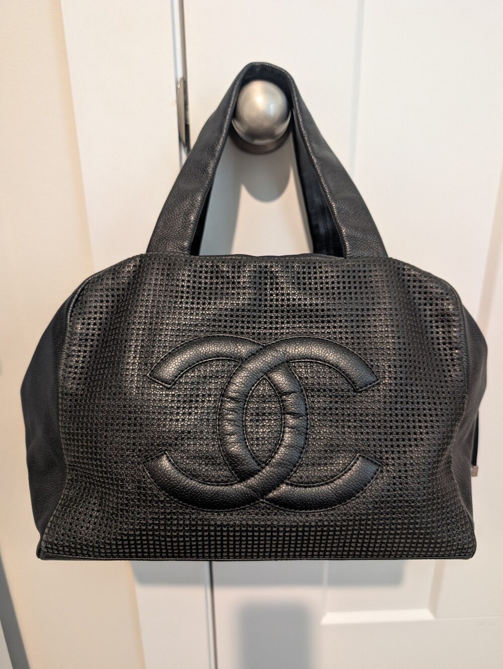 Authentic Chanel Black Perforated Leather CC Handle Bag